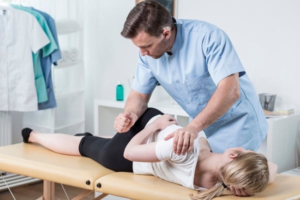 Chiropractor treating patient in Lithia Springs