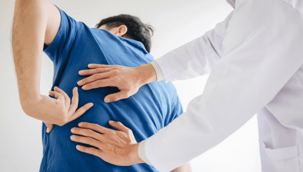 chiropractor-adjusting-patient-after-a-car-wreck-in-Newnan-ga