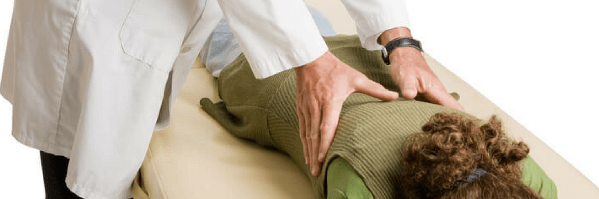Chiropractor adjusting the Thoracic Spine 